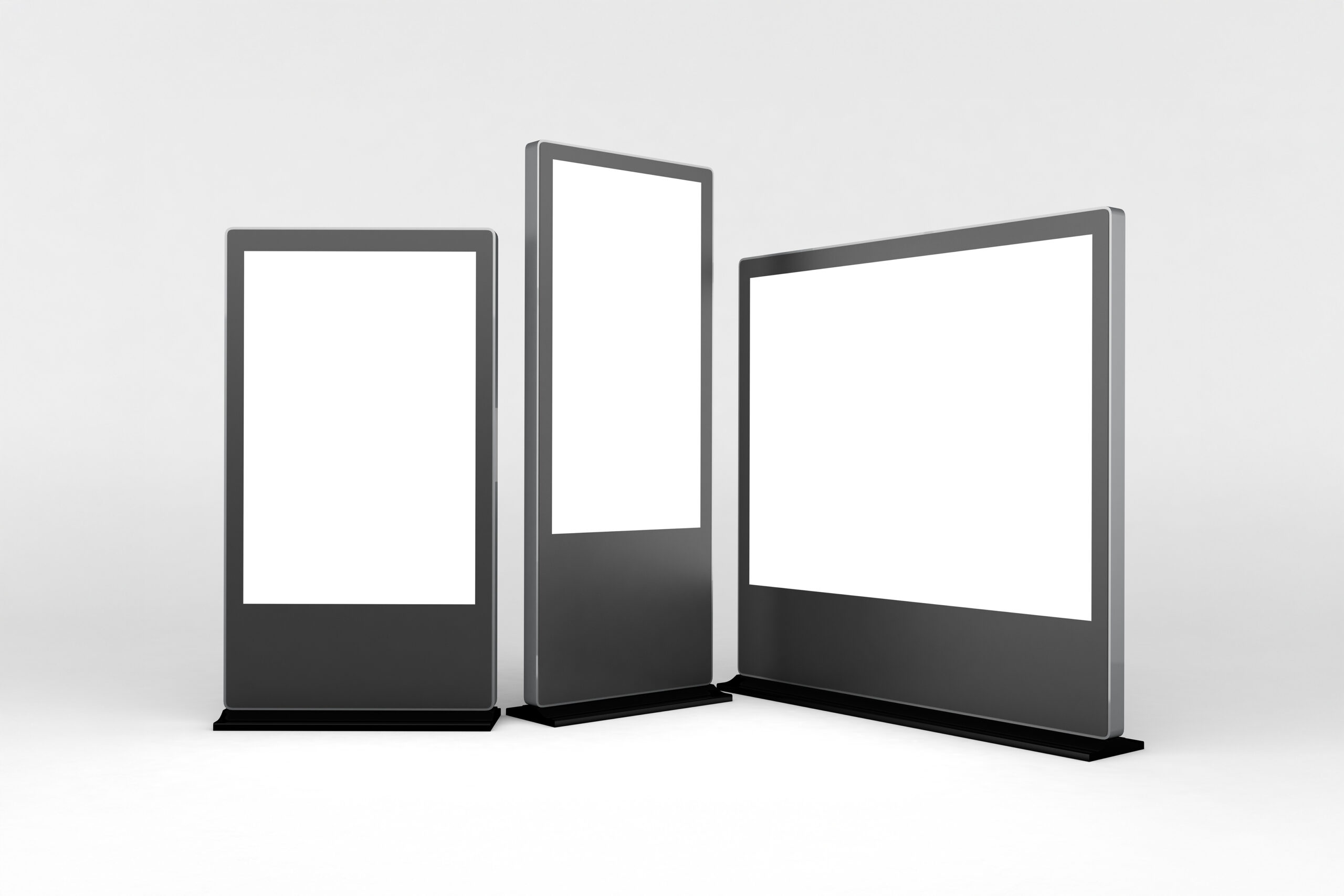 multiple digital signage displays white backdrop